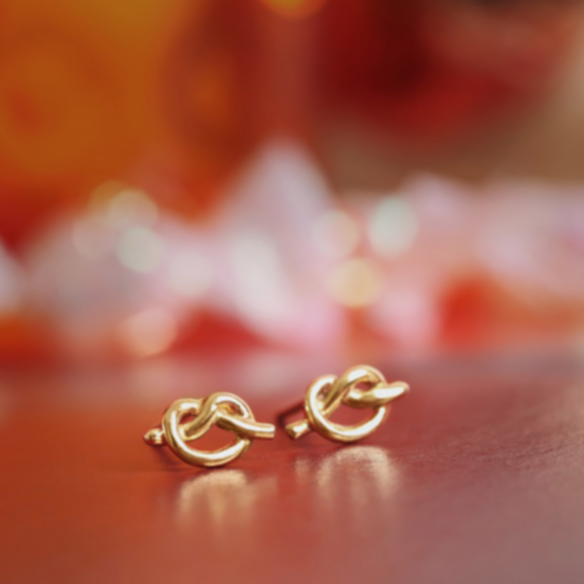 گوشواره گوشواره میخی طلا طرح گره کوچک کد EM282